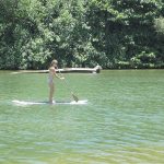 Jen paddling the hanalei river